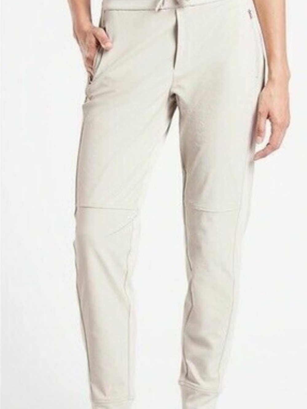 Athleta Headlands Hybrid Trek Mid rise jogger in a light neutral shade.